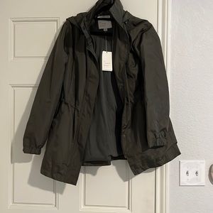 Drawstring rain jacket windbreaker with tags